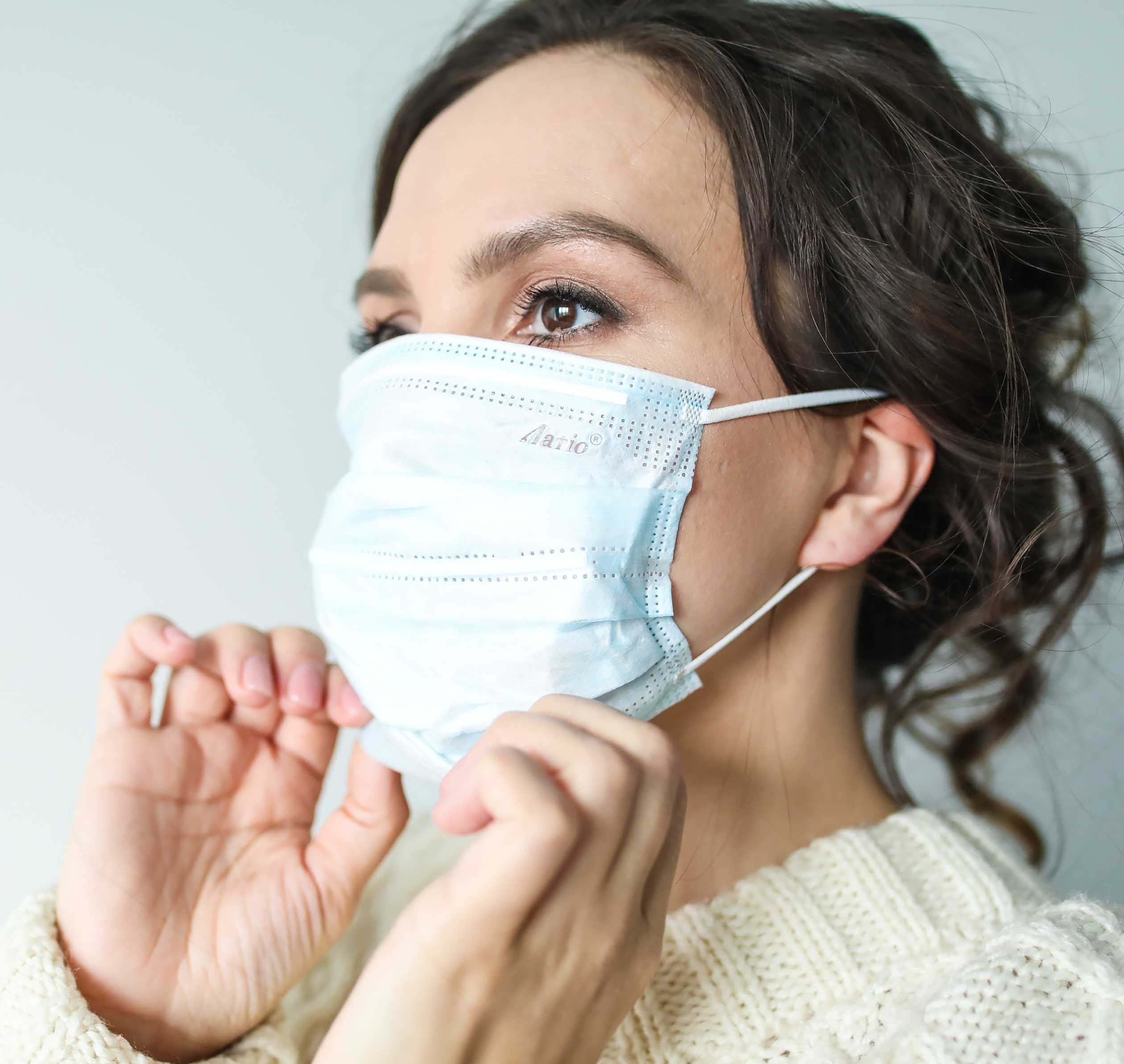 Woman wearing a surgical mask